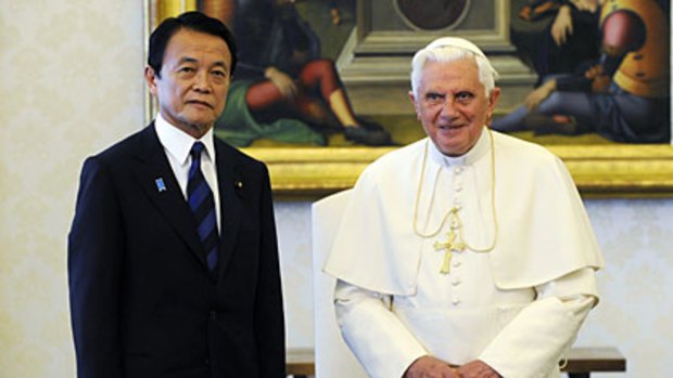 Close the gap... Pope Bennedict with Japan's Prime Minister Taro Aso.