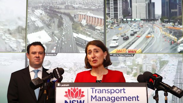 Premier Gladys Berejiklian and WestConnex Minister Stuart Ayres announce the rebate on Monday.