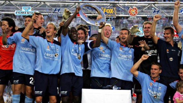 Dwight Yorke and Sydney FC celebrate the inaugural championship.