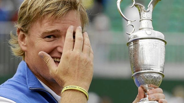 Ernie Els of South Africa holds the Claret Jug trophy after winning the British Open Golf Championship at Royal Lytham & St Annes.