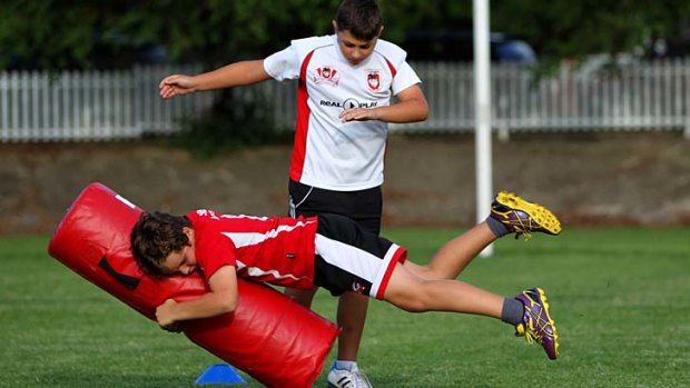 Emphasis on enjoyment: Hurstville United Junior Rugby League Club Under-11s train at Bexley Oval.