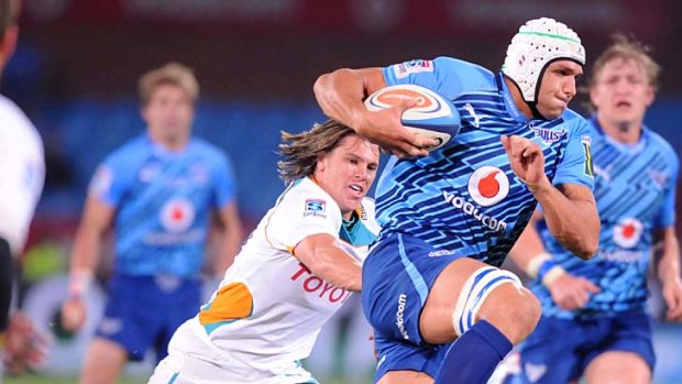 Juandre Kruger of the Bulls skips clear of the Cheetahs' defence.
