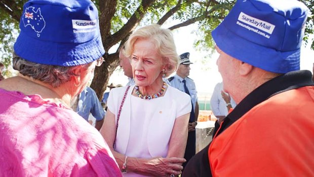 Ms Bryce talking to victims of the Queensland floods in 2011.
