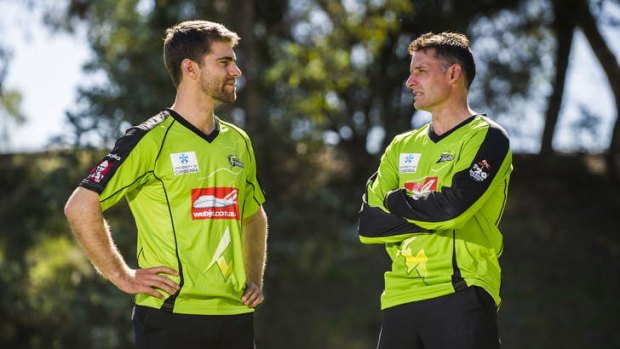 Sydney Thunder players Ryan Carters and Mike Hussey in Canberra.
