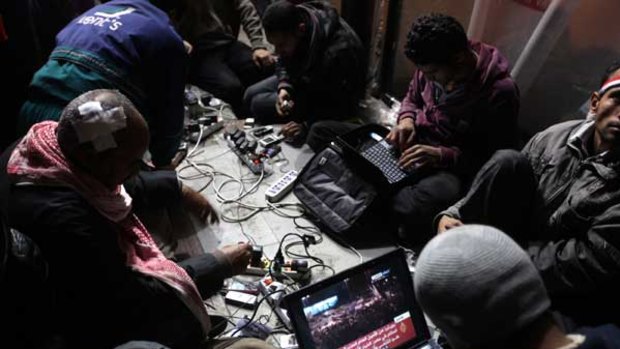 Egyptian anti-government bloggers during the protests in Tahrir Square last week. Earlier in the campaigning the government had severed the country's access to the internet.