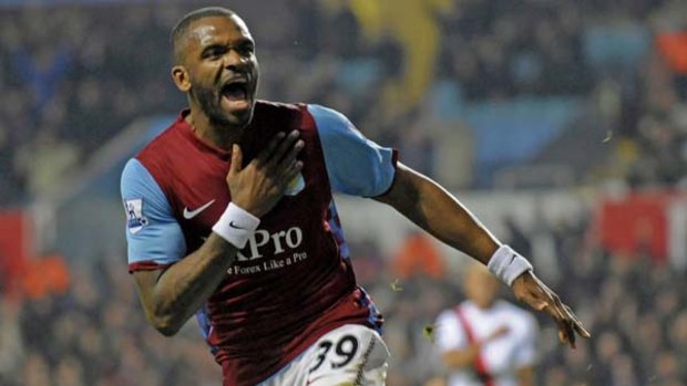 Net investment ... England striker Darren Bent scores on his debut for Aston Villa. The club paid $38 million for him this month.