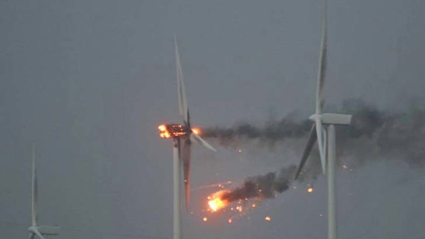 On fire ... strong winds forced this turbine to spin so quickly it burst into flames.