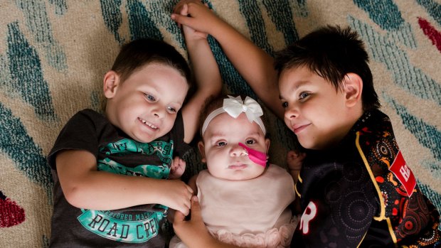  Stella Bella Children's Centre will help families including that of little Arcadia Williams, who has Costello syndrome, pictured here with her big brothers Benji Williams 3, and Tyeren Smith 8. 