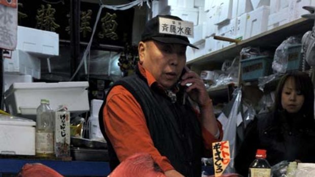 Abundant sashimi, for now … at Tokyo's Tsukiji fish market, traders cheered news of the defeat.