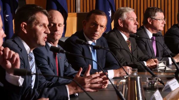Prime Minister Tony Abbott with state premiers and chief ministers at COAG earlier this month.