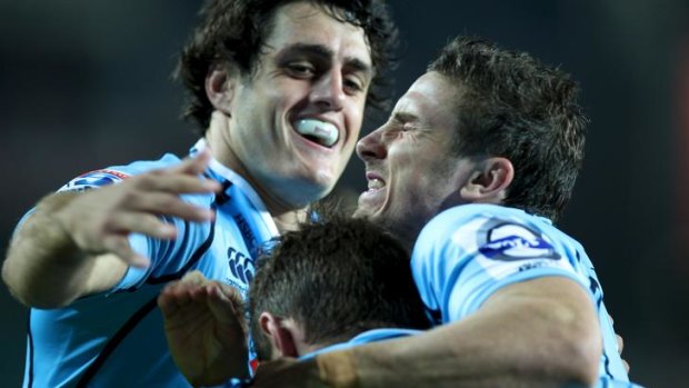 Quick start ... the Waratahs celebrate after Bernard Foley scores in the first 40 seconds.