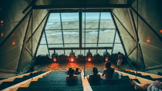 The glass-fronted sauna offers panoramic views over the Arctic Sea.