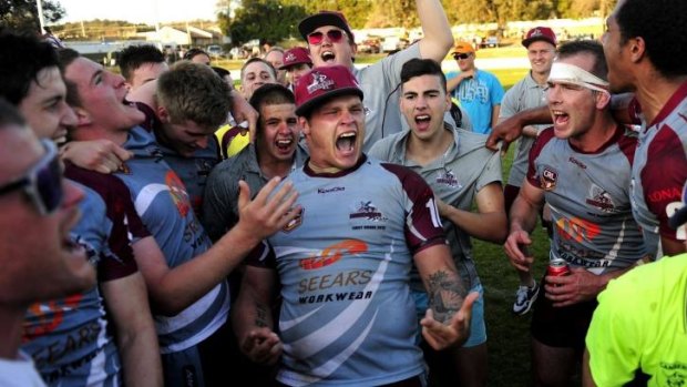 Queanbeyan Kangaroos players and supporters sing their old club song after winning the 2013 Canberra Raiders Cup grand final.