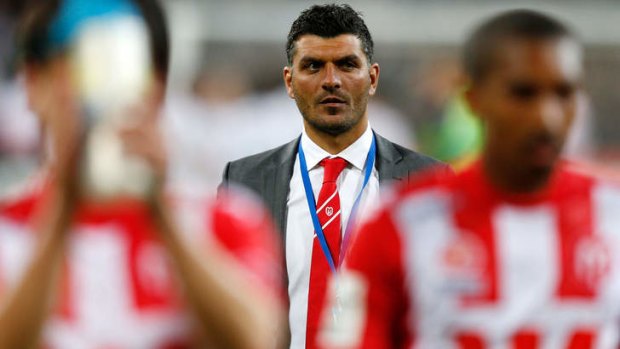 John Aloisi cut a lonely figure after the final whistle.