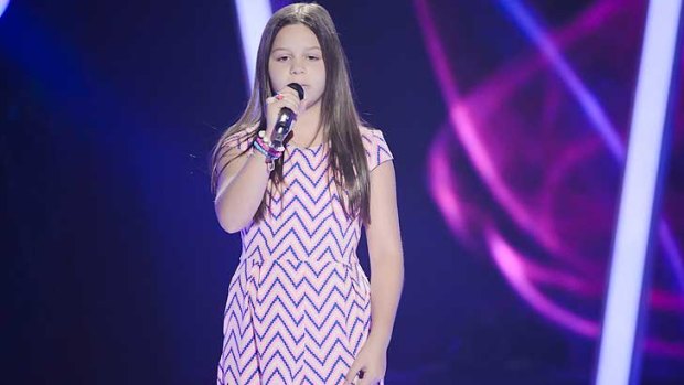 12-year-old Romy sings on <i>The Voice Kids</i>, but fails to earn the judges' attention.