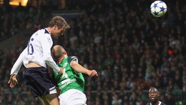 Peter Crouch scores Tottenham's second goal as Spurs blow a two-goal lead against SV Werder Bremen.