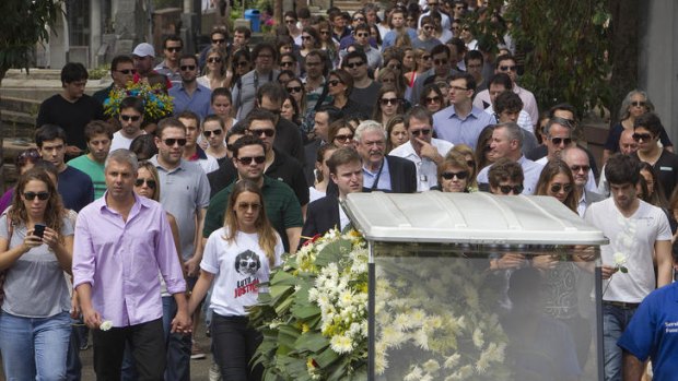 The funeral procession for Brazilian student Roberto Laudisio Curti arrives at the cemetery in Sao Paulo, Brazil.