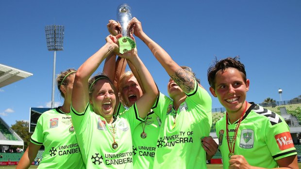 Canberra United players celebrate their W-League grand final victory against Perth Glory in December last year.