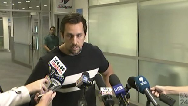 He's back: Mitchell Pearce speaks to media at Sydney Airport.