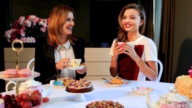 High tea: Kate Waterhouse and Miranda Kerr.