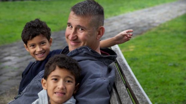 American lawyer Michael Mori with two of his three sons, Enrico (far left) and Dante.