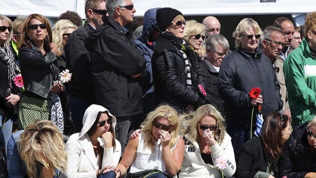 Hundreds gathered at Dolphin Point in Coogee to pay their respects.