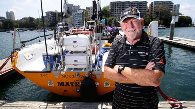 Commander Terry Slader with the Spirit of Mateship.