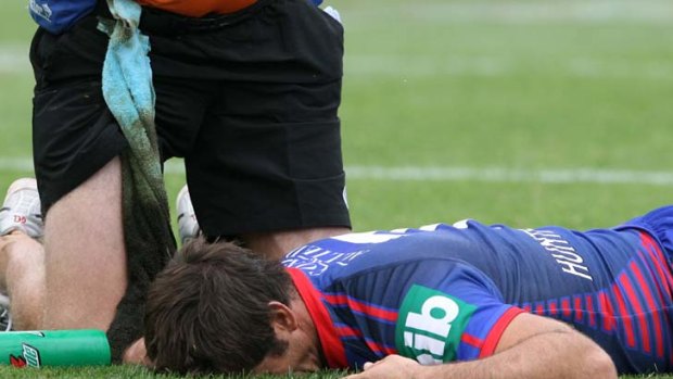 Seeing stars ... Newcastle's Andrew Johns lays injured after feeling the full force of the Bulldogs' Sonny Bill Williams, who was sent off for this tackle in the first round of the 2007 season.
