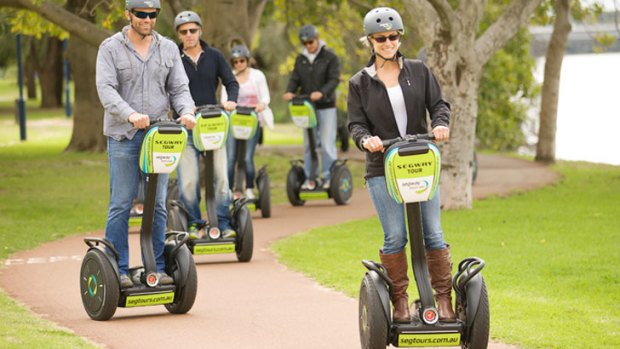 A segway tour rides along the foreshore.