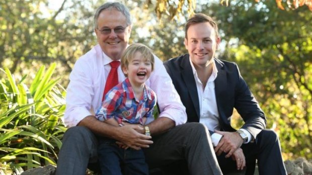 Dr Tim Hawkes with son Peter and grandson William in the grounds of King's School. Hawkes is the author of a new parenting manual, <i>Ten Conversations You Must Have With Your Son</i>. 