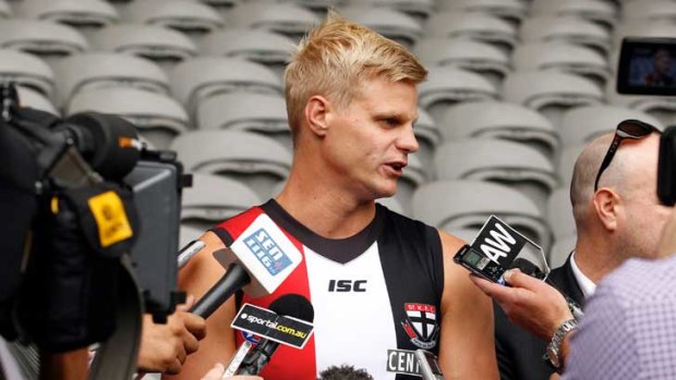 In the hot seat: Nick Riewoldt talks to the media at Etihad Stadium yesterday.