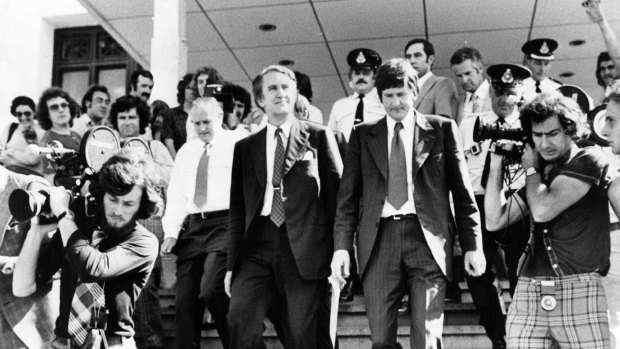 Malcolm Fraser leaves Parliament House in 1975. A new seat in Victoria will be named after the former prime minister. 