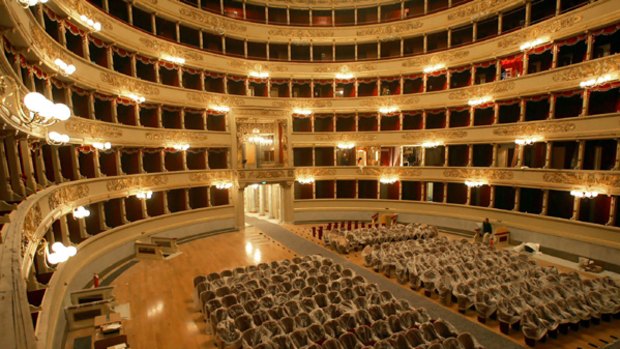 Glittering prize ... the interior of the La Scala theatre is an elaborate mix of red silk, gold sculptures and chandeliers.