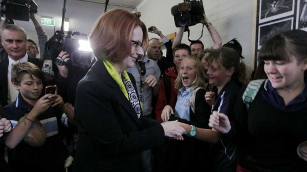 Prime Minister Julia Gillard meets students during her visit to Lyneham High School  in Canberra.