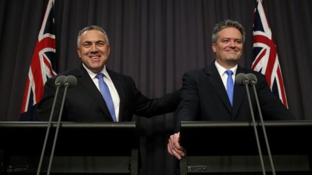 Treasurer Joe Hockey and Finance Minister Mathias Cormann announce the deal to repeal the mining tax.