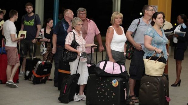 British tourists queue at the departure gate as they are evacuated at Moi International Airport in the Kenyan coastal city of Mombasa.