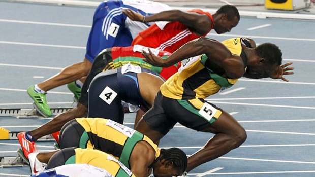 Usain Bolt of Jamaica makes a false start during the men's 100 metres final.