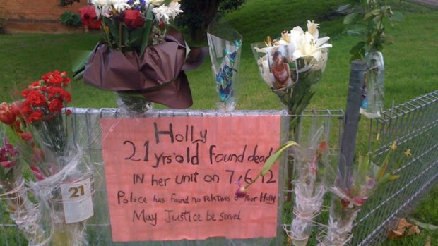 Tributes for Holly ... flowers outside her home.