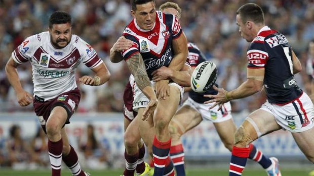 Sonny Bill Williams offloads in the NRL grand final.