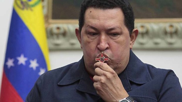 A modern man ... Venezuelan President Hugo Chavez has announced on Twitter he has returned to the country following cancer surgery in Cuba.
