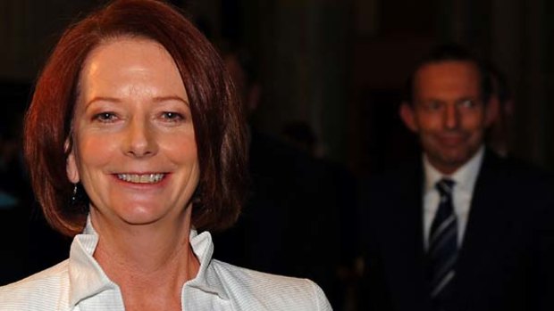 Won the support of two key independents ... Julia Gillard was returned as Prime Minister,  ahead of  Coalition leader Tony Abbott.