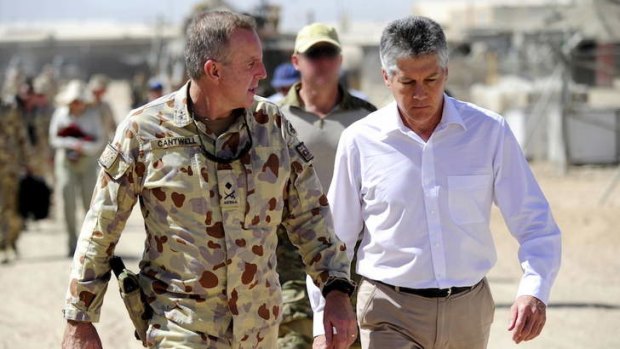Defence Minister Stephen Smith with John Cantwell during an earlier visit to Afghanistan. The Minister has spend the past two days in the country speaking with Australian troops and President Hamid Karzai.