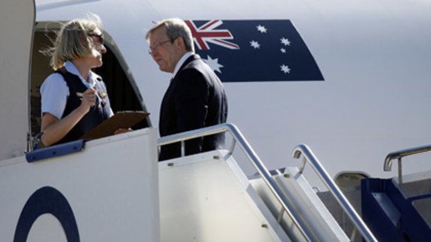 Preparing to take off . . . Kevin Rudd boarding his plane for Jakarta yesterday.