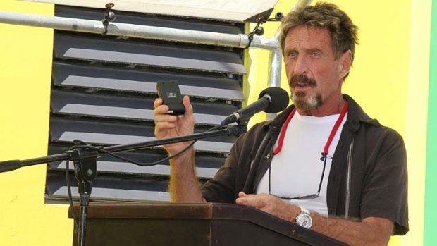 On November 8 just days before the murder John McAfee speaks at the official presentation of equipment ceremony that took place at the San Pedro Police Station.