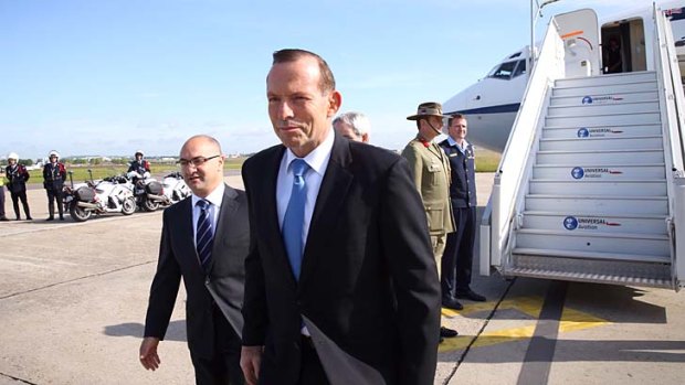 If it's Thursday, it must be Paris: Tony Abbott arrives in France, where he has a busy schedule of commemorations and meetings.