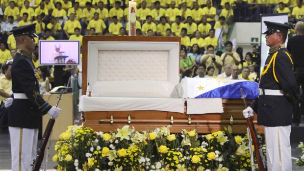 Honour guards stand near the coffin of late former Philippine President Corazon Aquino.