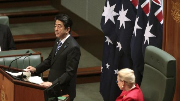 Japanese Prime Minister Shinzo Abe addresses the House of Representatives as Speaker Bronwyn Bishop looks on.