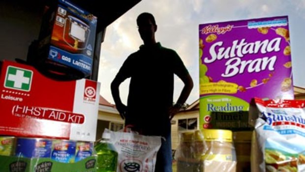 Stocking up . . . Tony, a survivalist from Baulkham Hills, with emergency supplies should the apocalypse arrive.