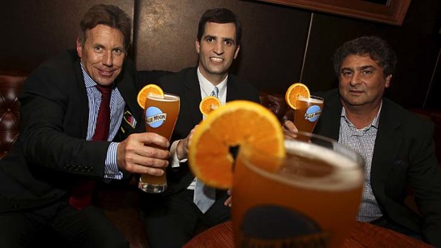 Here for the beer:  CCA’s beverages managing director John Murphy, left, David Coors of Molson Coors and John Casella.