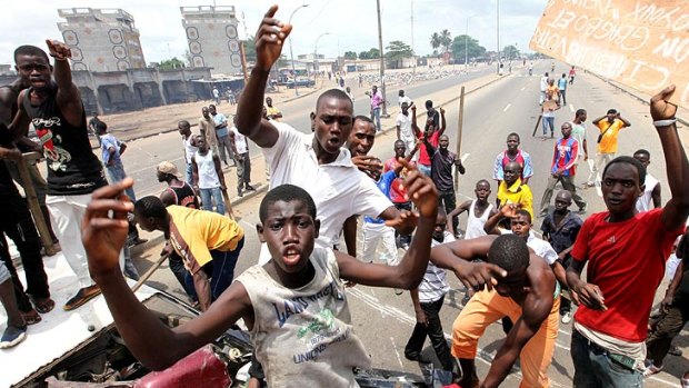Anti-government protesters in Abobo following a massacre by security forces.